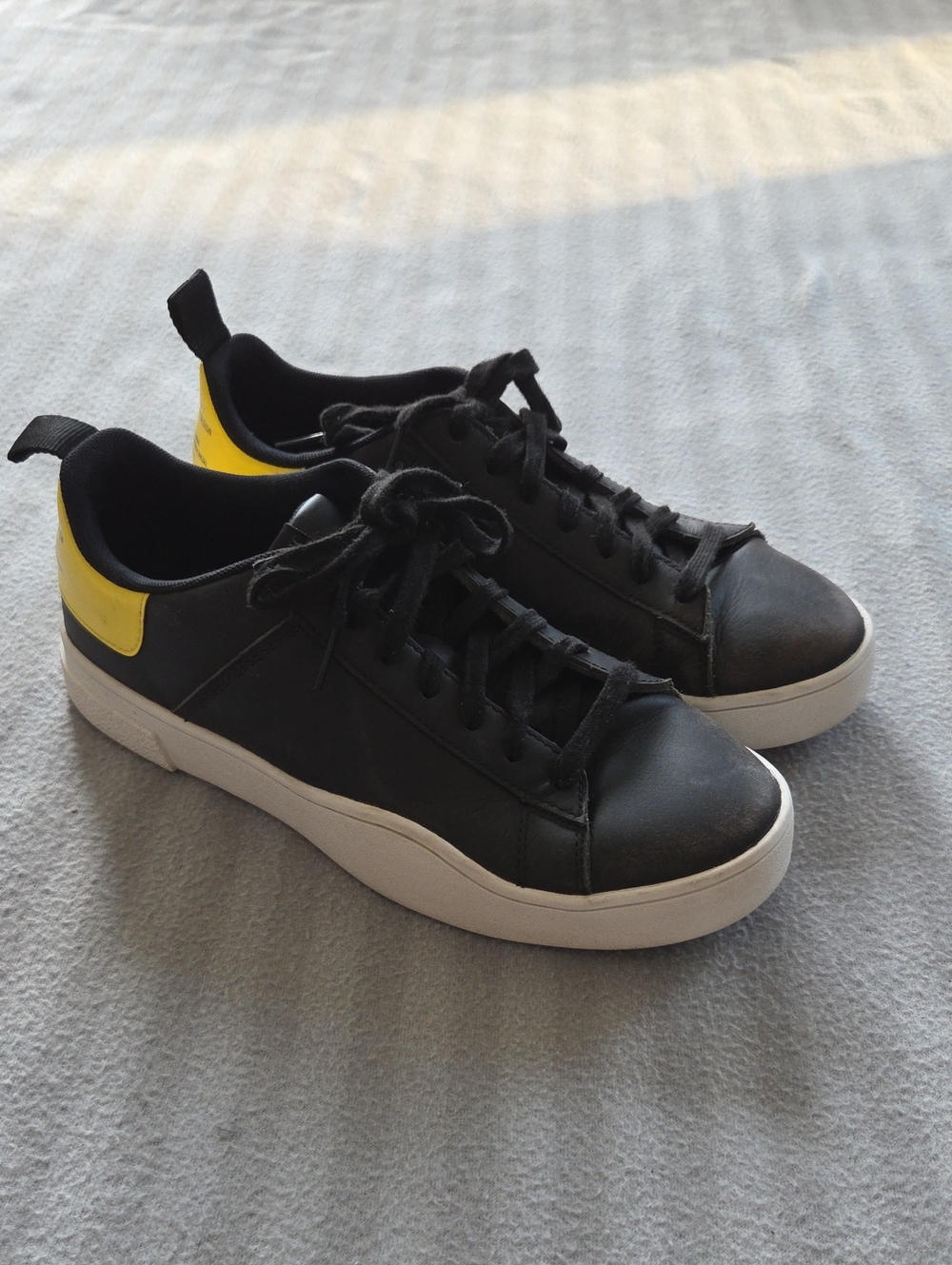 Diesel Black Low-Top Sneakers with Yellow Heel Patch